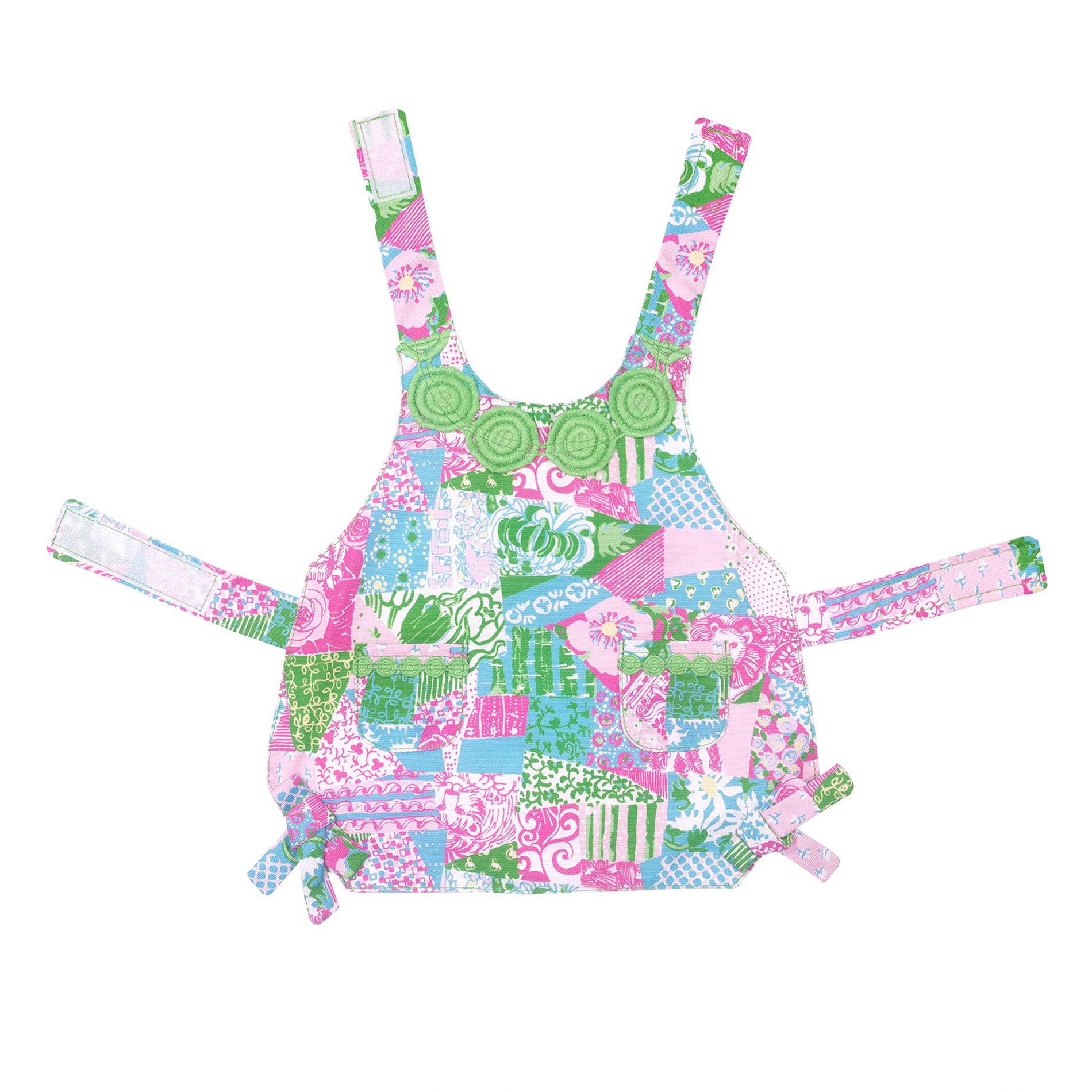 Colorful patchwork dress with floral and geometric patterns on a white background