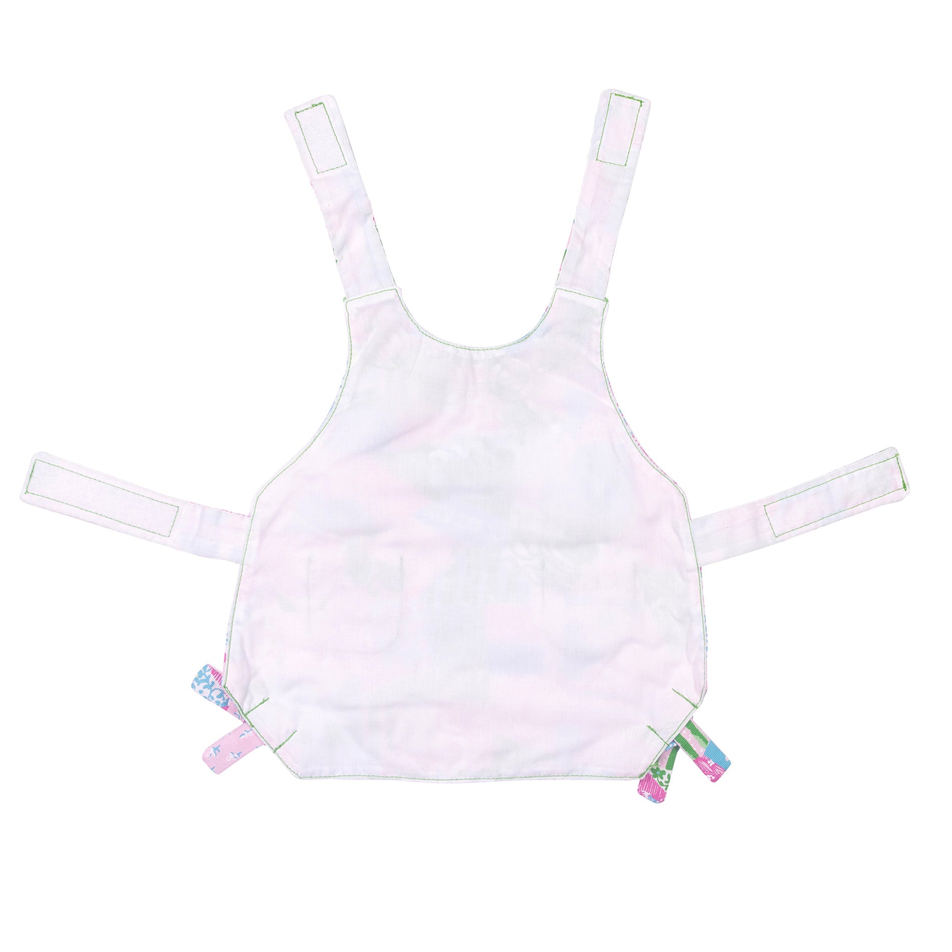 White pet dress with colorful straps on a white background 