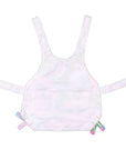 White pet dress with colorful straps on a white background 
