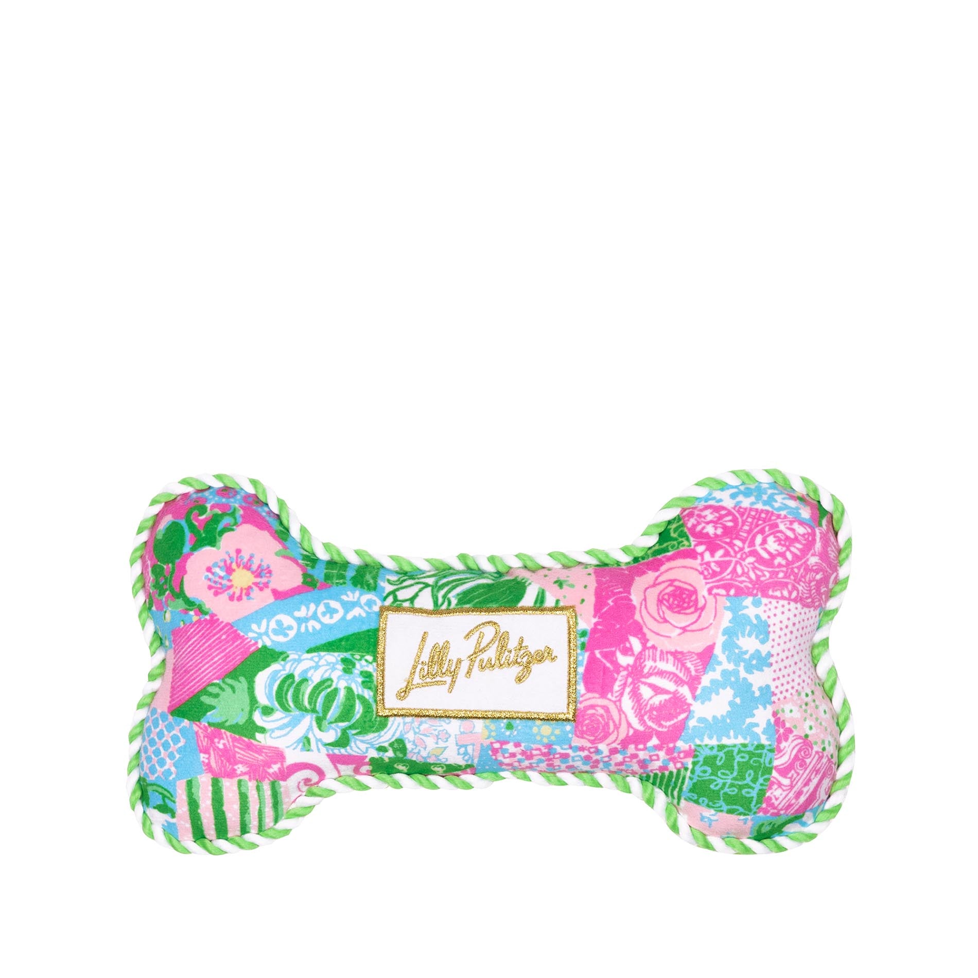 Colorful bone-shaped pillow with floral patterns and a Lilly Pulitzer logo on a white background