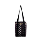 Black tote bag with white polka dots on a white background