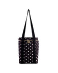 Black tote bag with white polka dots on a white background