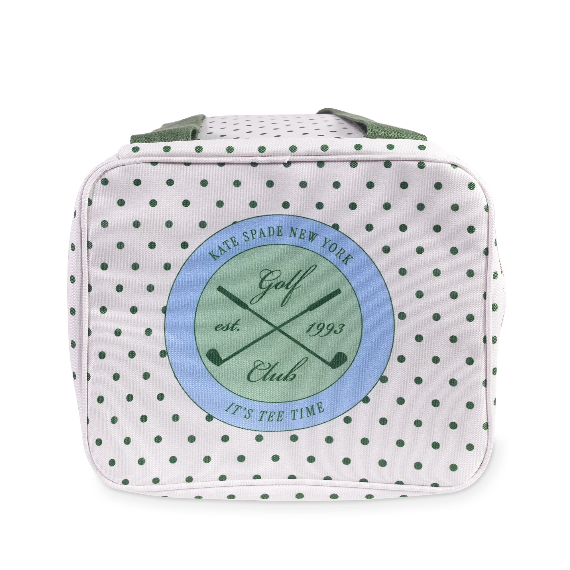 White polka dot bag with green strap on a white background