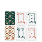 Set of playing cards with decorative designs on a white background