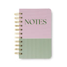 Notebook with pink and green striped cover and 'NOTES' text on a white background