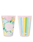 Two colorful cups, one with floral design and the other with striped pattern, on a white background.
