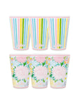 Two sets of colorful cups with striped and floral patterns on a white background