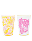 Two colorful tumblers with floral and palm tree designs on a white background