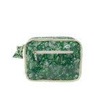 A green toiletry bag with a white botanical and tropical leaf pattern, featuring a front zippered pocket and a matching fabric loop handle, shown against a plain white background.
