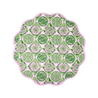 A scalloped round tablecloth featuring a green and pink floral and medallion pattern, shown flat against a solid white background.