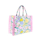 Floral tote bag with ruffled edge on a white background