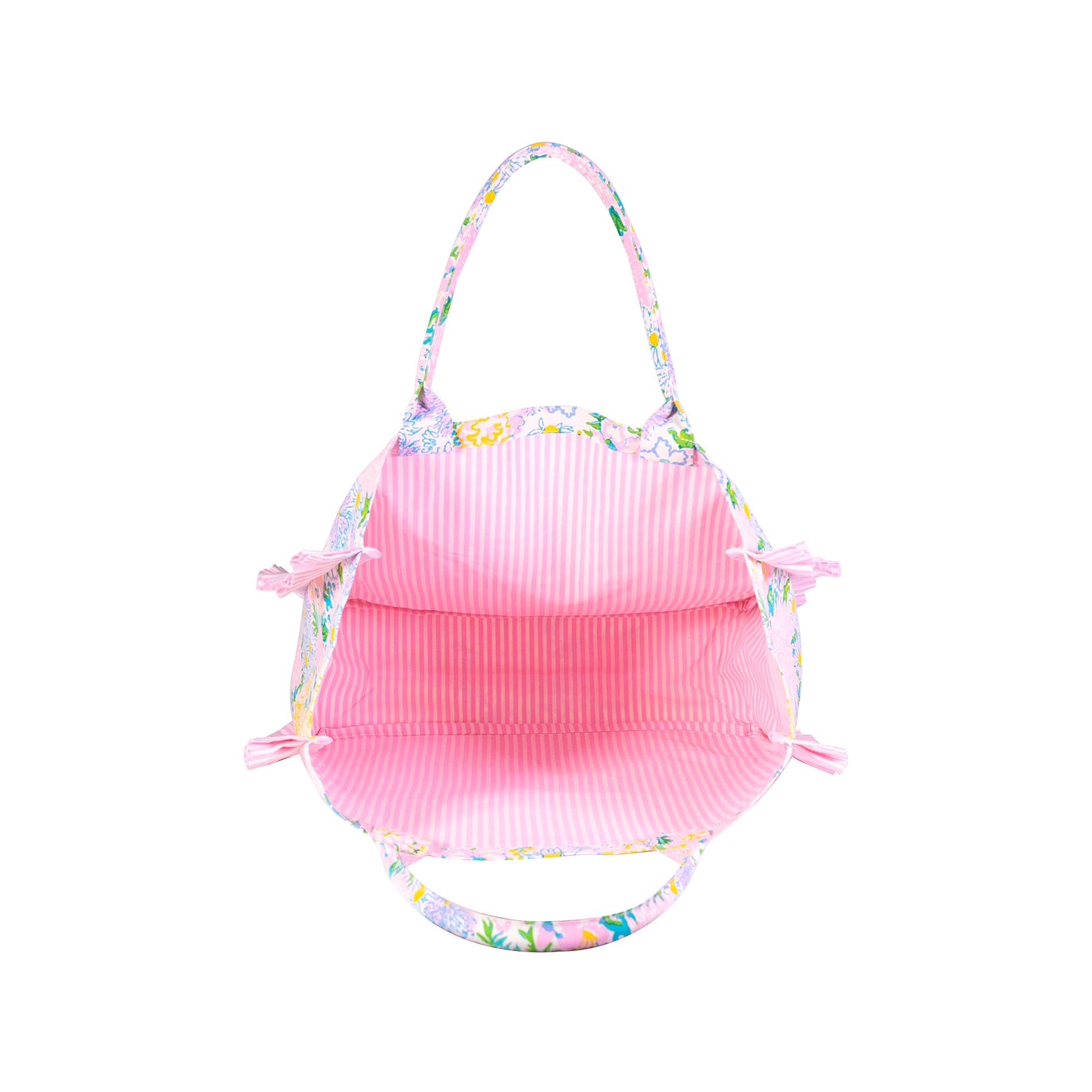 Pink ribbed swimsuit with floral trim on a white background
