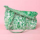 folded down green and white tropical botanical print tote bag with ruffled trim and long shoulder straps