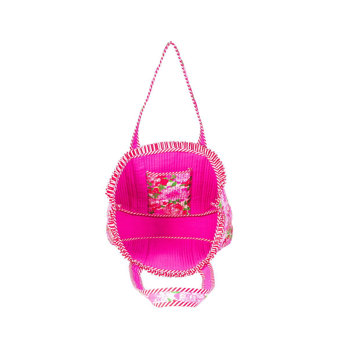 A bright pink woven tote bag with a floral patterned interior pocket and striped rope handles, shown against a plain white background.