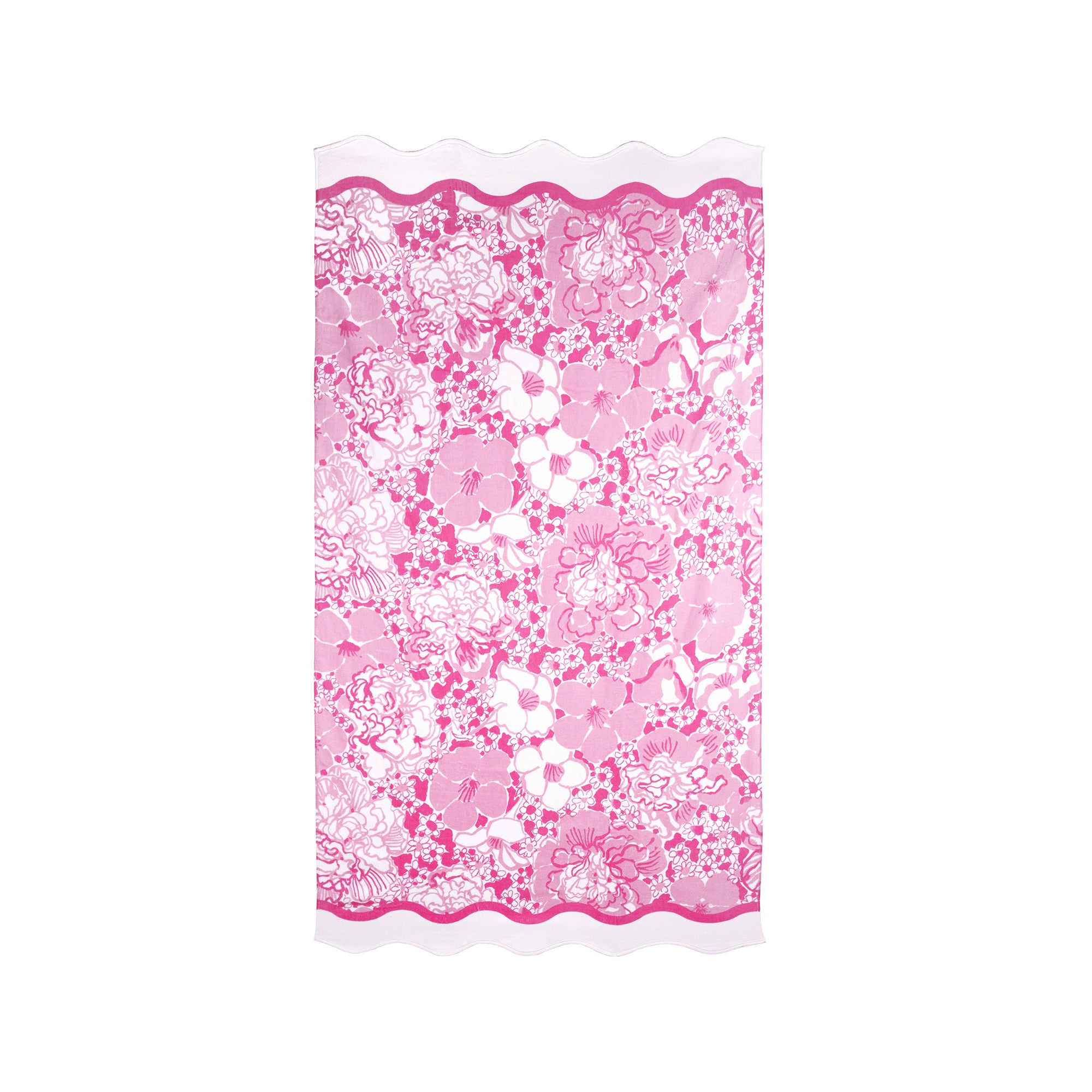 Pink floral beach towel with scalloped edge on a white background