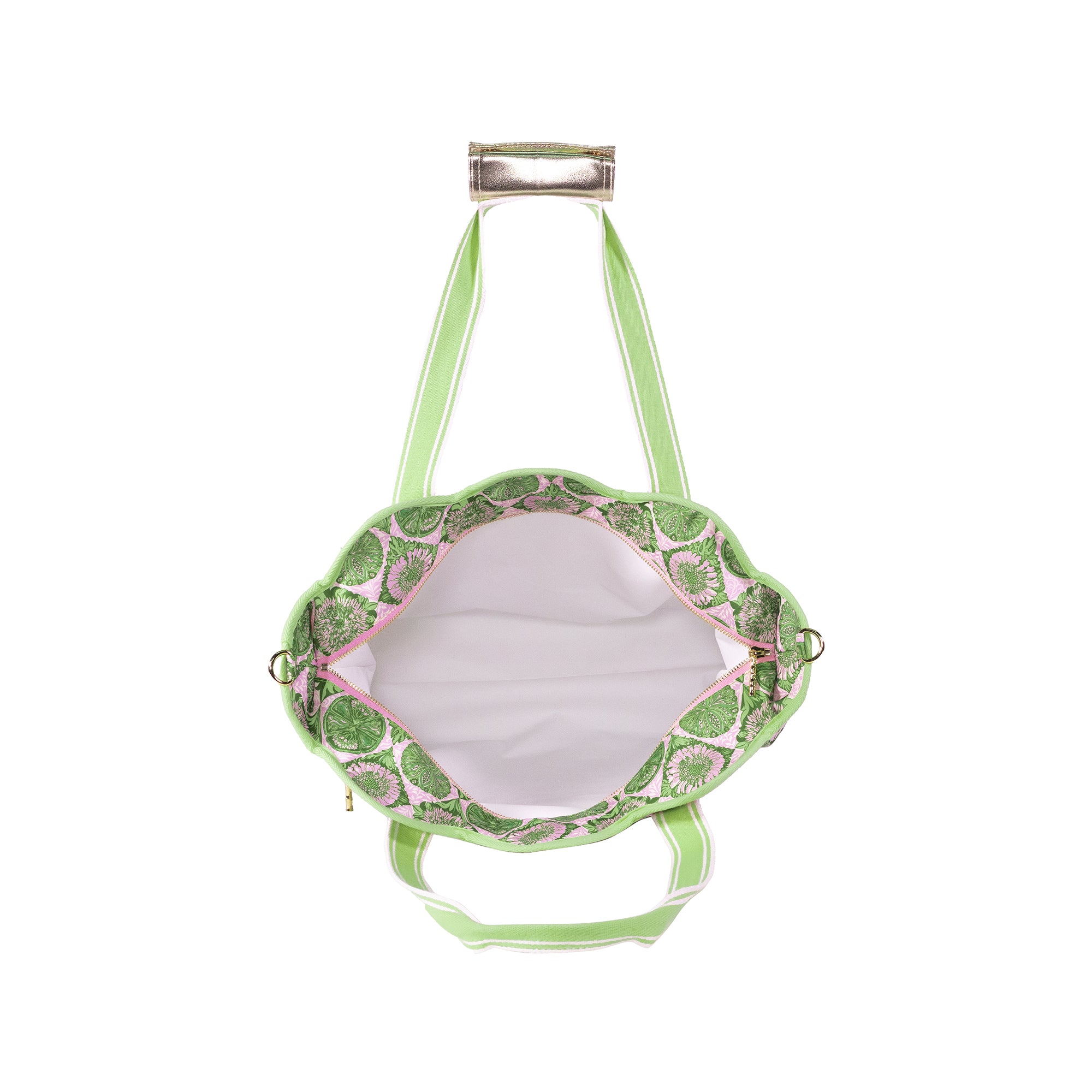 The interior view of a light green shoulder bag with a green and white patterned lining and a white interior, shown against a plain white background.