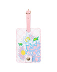 Floral design luggage tag with pink strap on a white background