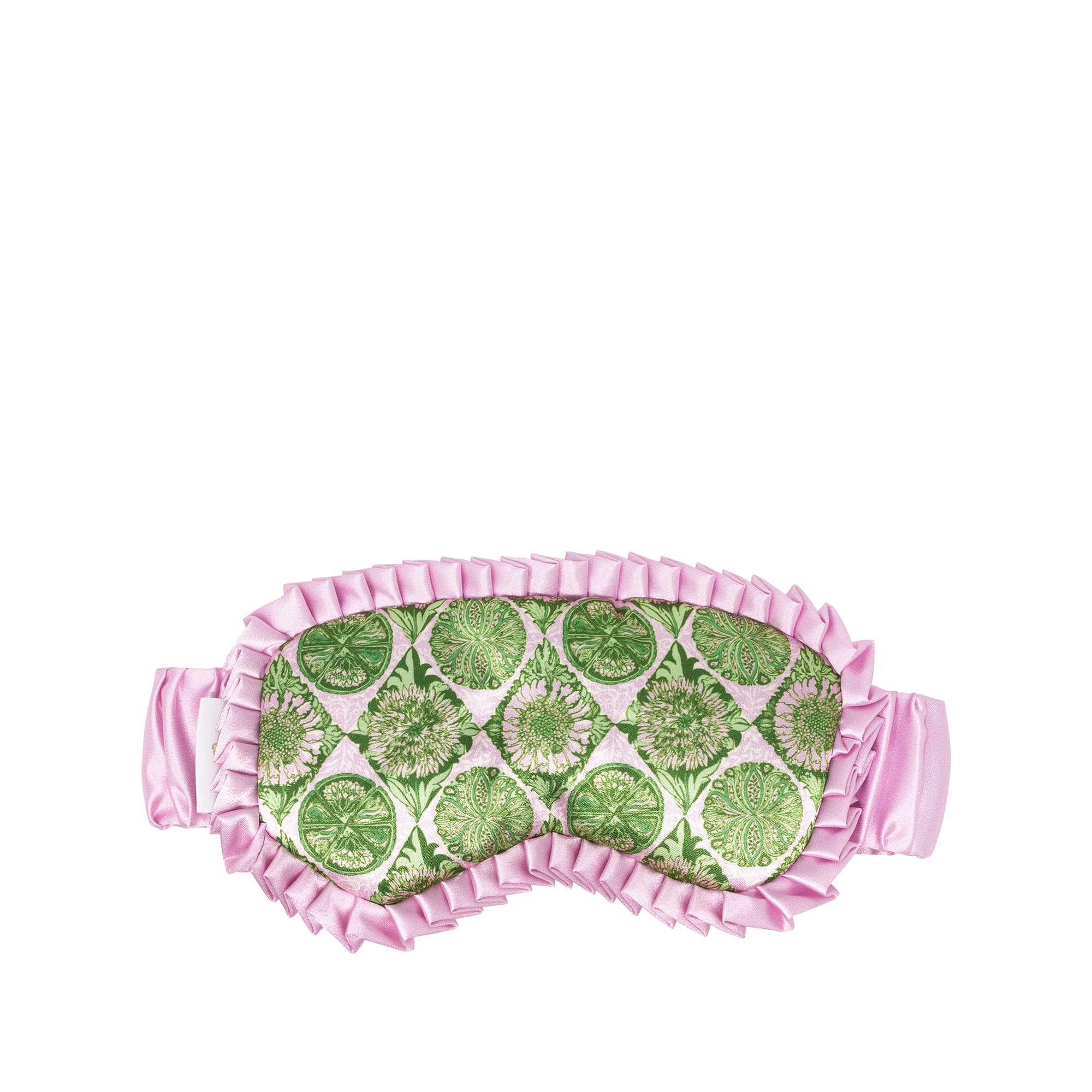 A pink sleep mask with a green and white  pattern on the front, finished with a ruffled satin trim and an elastic strap, shown against a plain white background.
