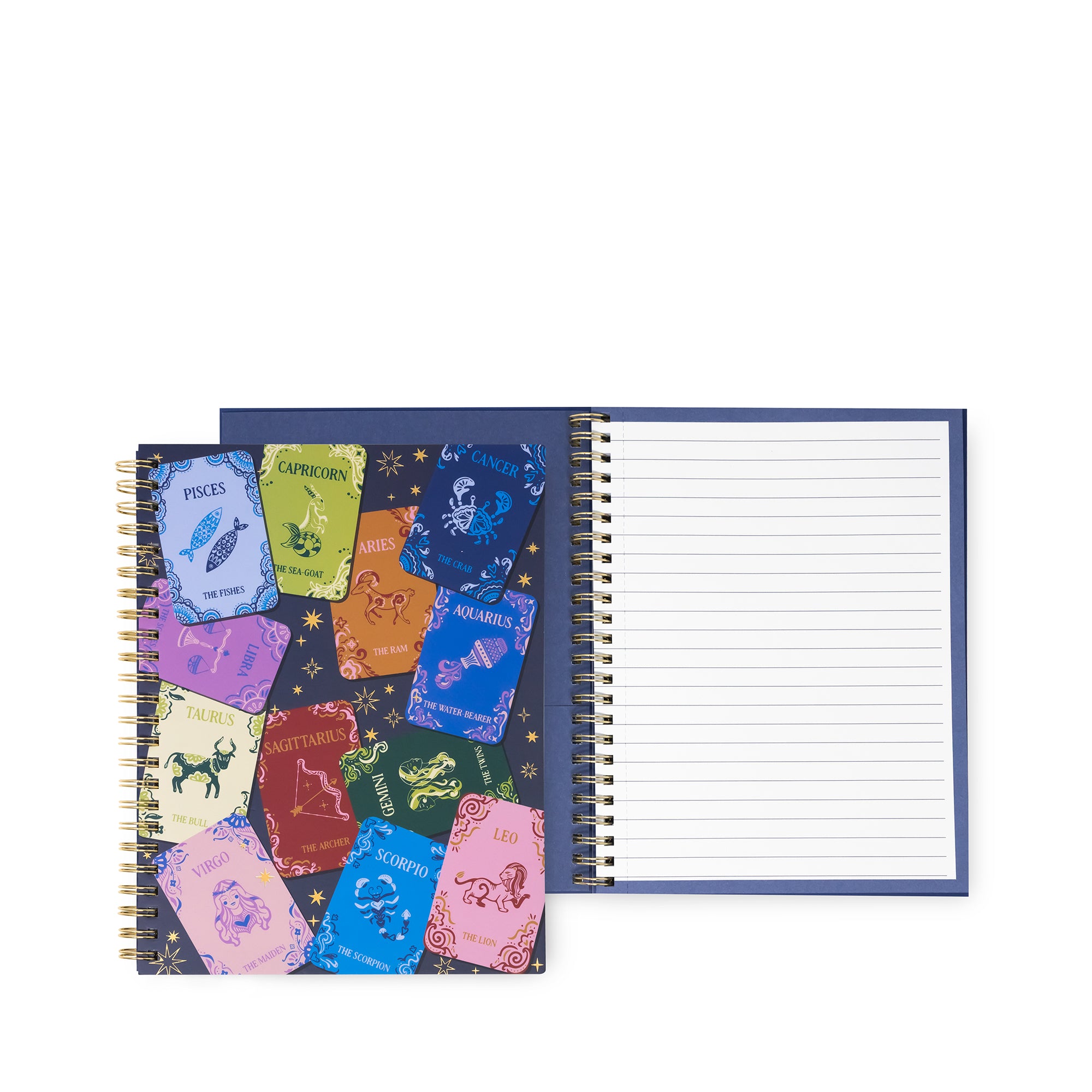A spiral-bound notebook shown open on a white background, with lined white pages on the right and a dark cover on the left decorated with colorful zodiac-themed cards.