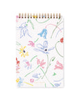 Notebook with colorful floral pattern on a white background