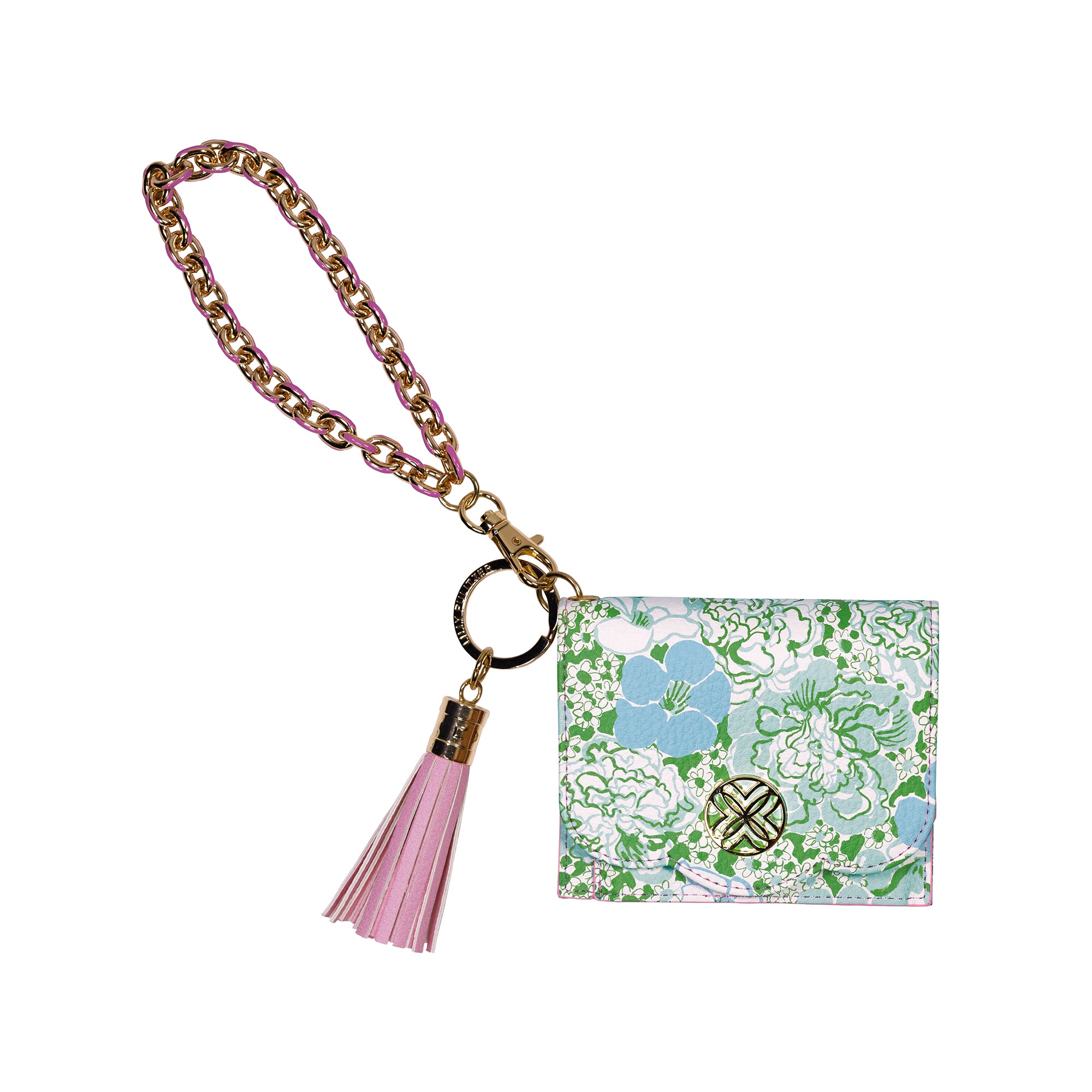 Keychain with floral design and pink tassel on a white background
