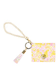 Keychain with floral design and tassel on a white background