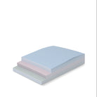 side view of Rectangular notepads  with blue and pink stripes on a white background