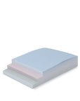 side view of Rectangular notepads  with blue and pink stripes on a white background