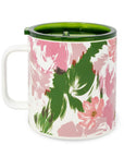 Floral-patterned mug with green interior on a white background