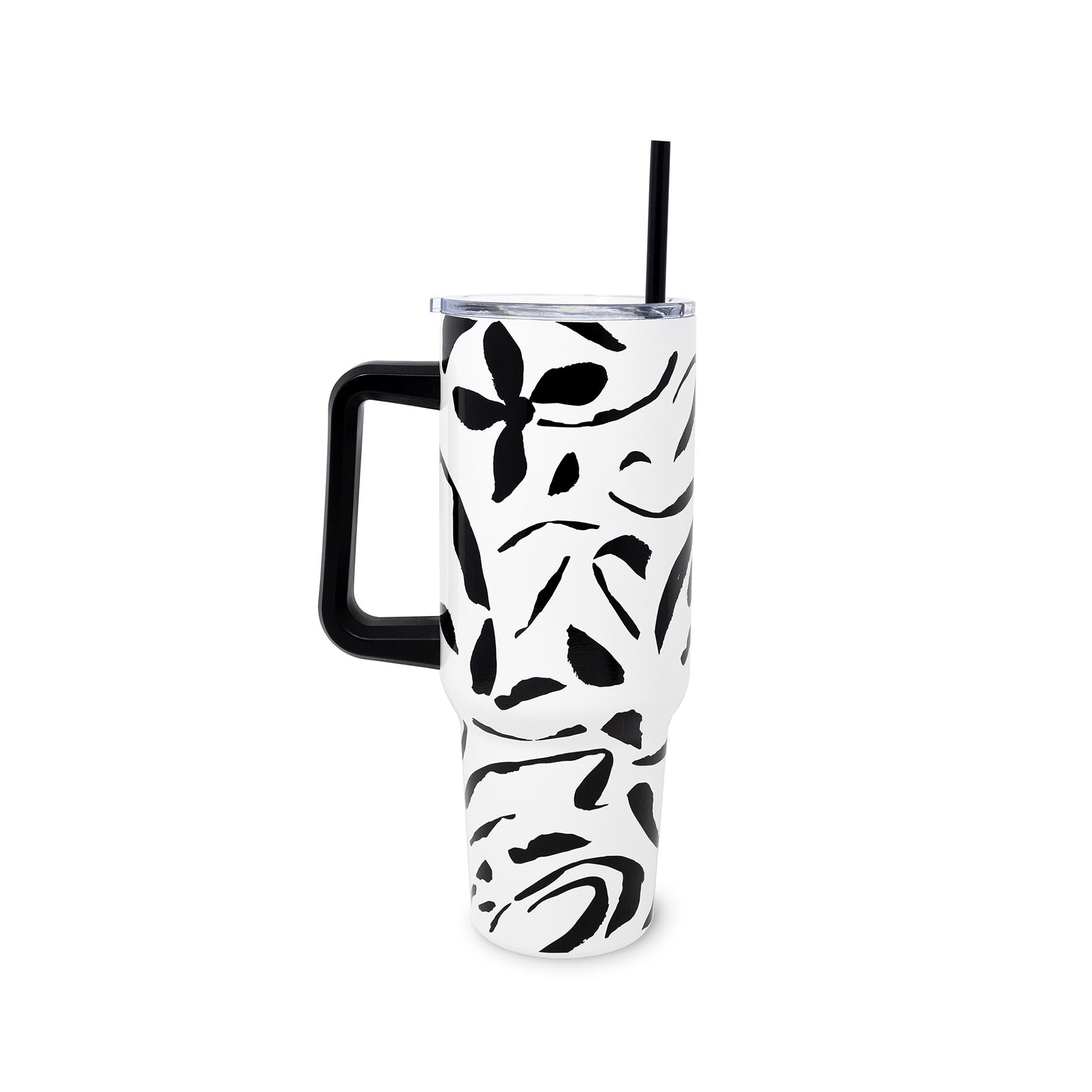 White tumbler with black floral pattern and handle on a white background