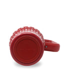 A red insulated travel tumbler with a handle, matching red lid and straw, decorated with bears