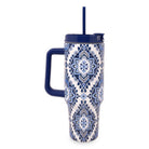 Tumbler with blue and white pattern on a white background