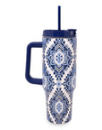 Tumbler with blue and white pattern on a white background