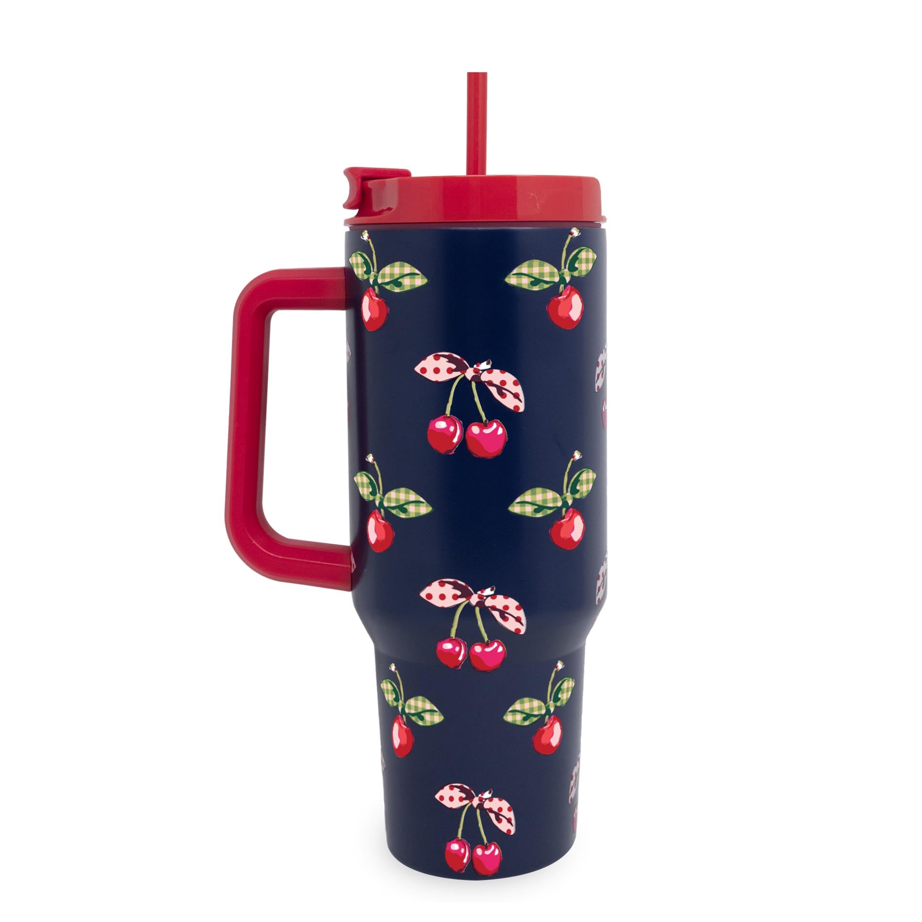 Navy blue tumbler with cherry pattern and red handle and lid on a white background