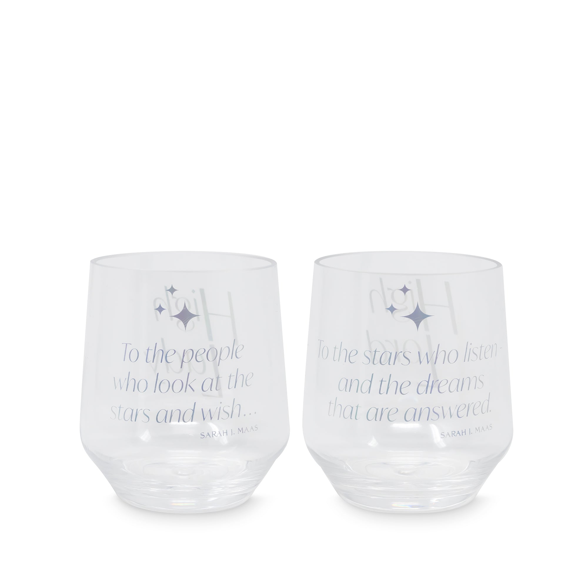 Two clear glasses with engraved text on a white background