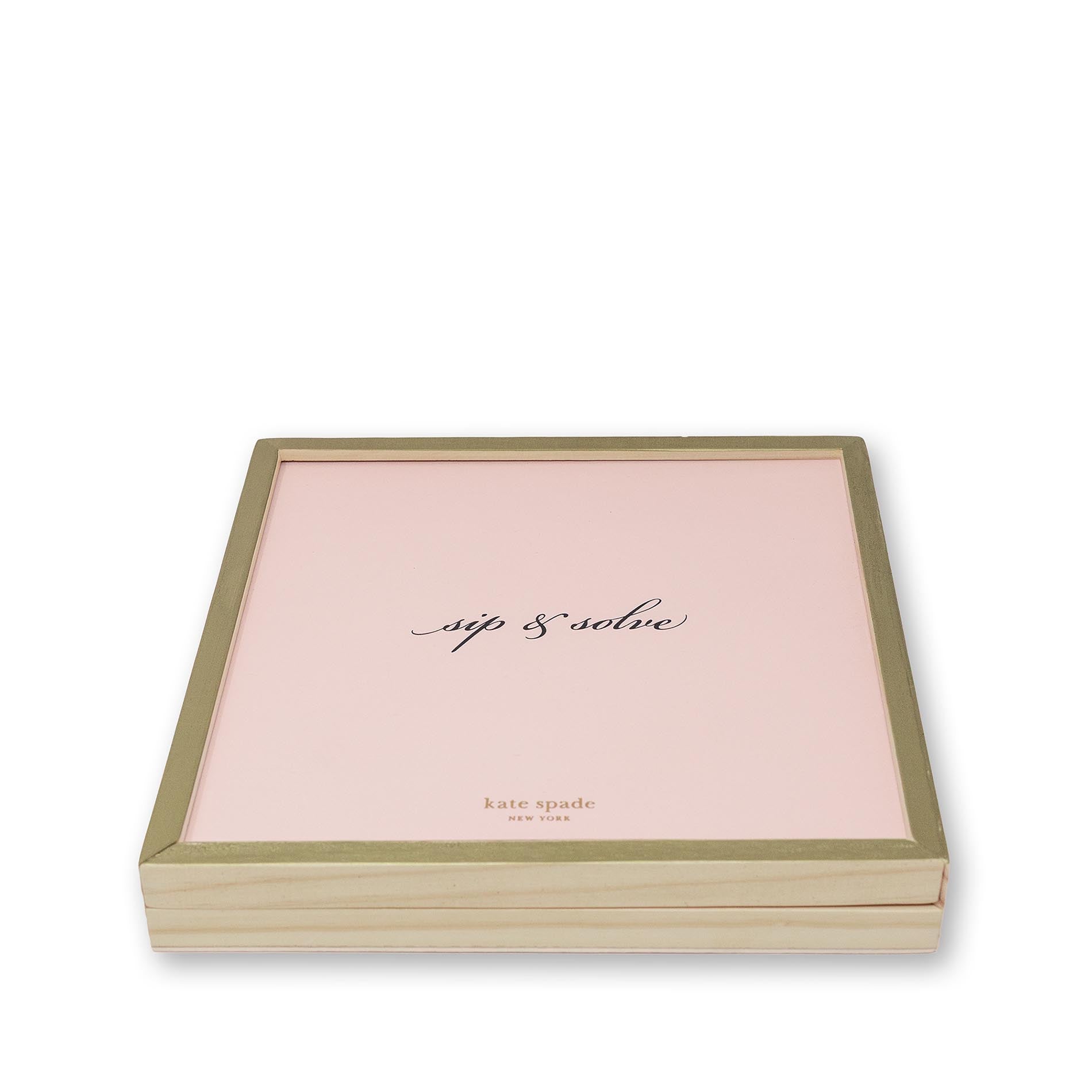 Pink game with gold trim and 'kate spade' branding on a white background