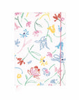 Floral patterned notebook with colorful flowers on a white background