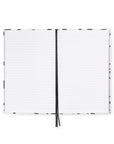 Open notebook with white pages and black binding on a white background