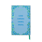 A light blue notebook with a decorative border of blue and green swirls and the text 'CANDID SURPRISING CEREBRAL ORIGINAL' printed in blue. A small green ribbon bookmark is visible at the bottom right.