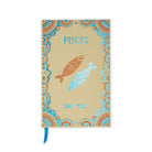 A Pisces zodiac-themed notebook with a beige cover, decorated with a blue and orange mandala border, two fish illustrations, and the words 'PISCES' and 'THE PISCES'. A blue ribbon bookmark hangs from the bottom.