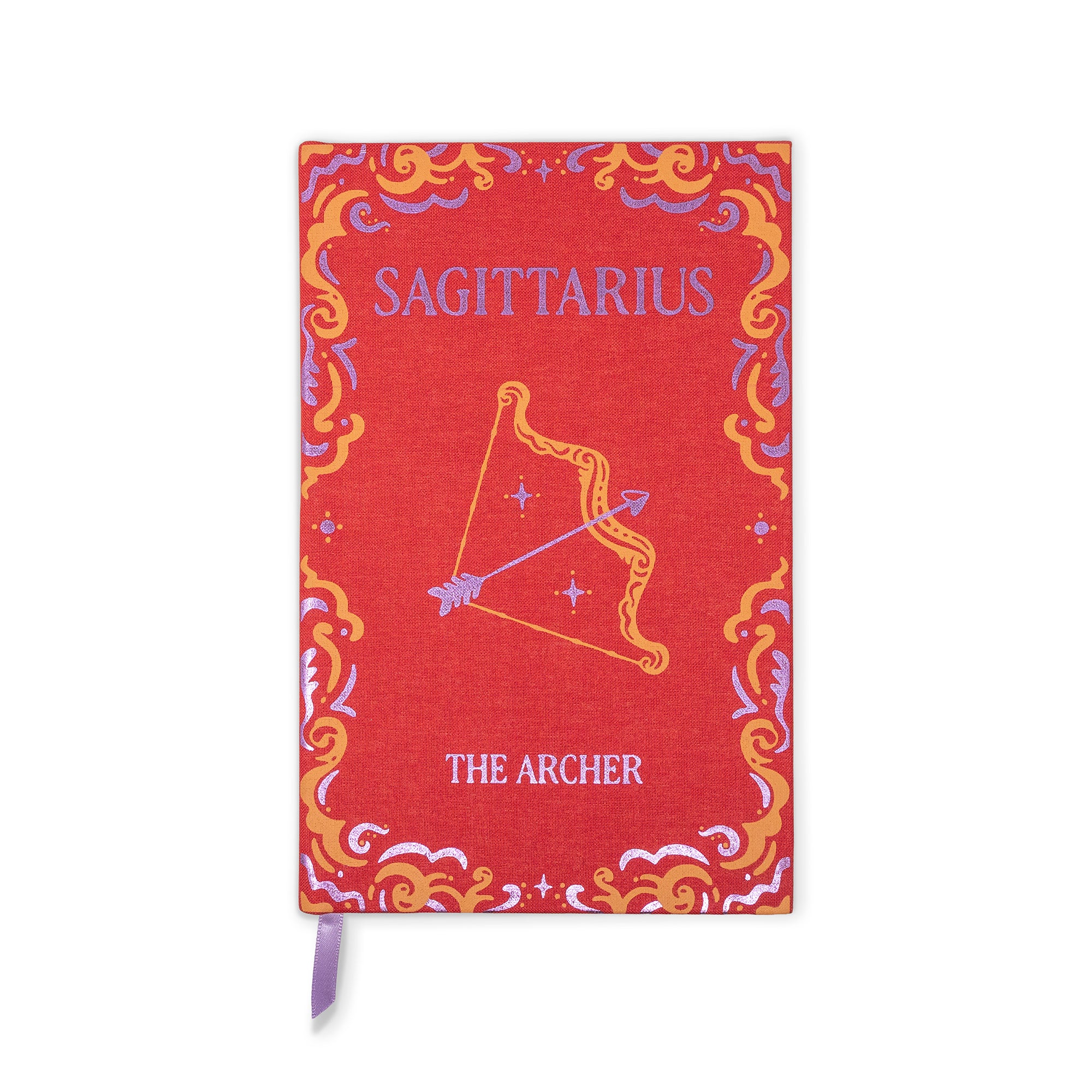 A red fabric-covered notebook or journal featuring the Sagittarius zodiac design, with a purple ribbon bookmark hanging from the bottom edge. The cover has a decorative border and shows the text 'SAGITTARIUS' and 'THE ARCHER'.