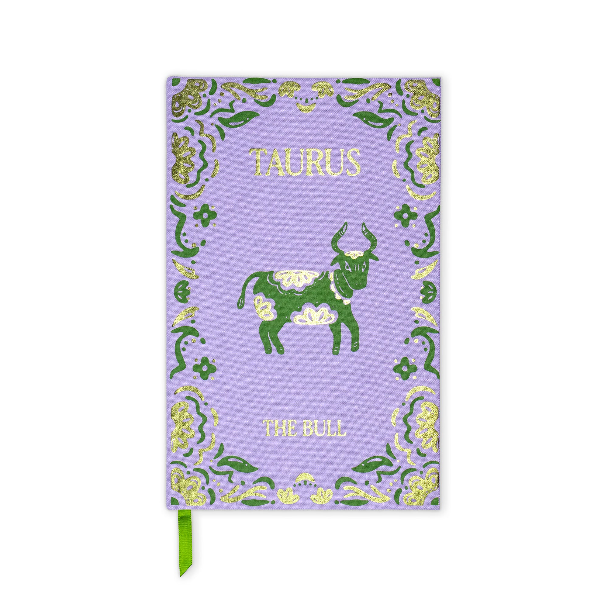 A purple Taurus zodiac-themed notebook with a green bull illustration, gold decorative border, and a green ribbon bookmark, shown on a white background.