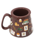 Brown mug with decorative patterns on a white background