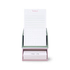 Notebook with a green and white striped holder on a white background