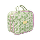 A rectangular zippered bag with a green and white palm tree pattern, pink piping, and a small gold brand plaque on the front, set against a plain white background.