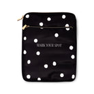 black travel book pouch with white polka dots and 'MARK THE SPOT' on the front