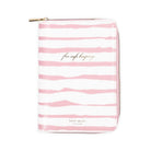 Pink and white striped pouch with 'kate spade new york' branding on a white background