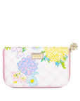 Floral-patterned travel wallet on a white background