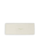 A rectangular ceramic serving platter in a warm cream color with a small gold foil logo reading 'STEEL MILL' in the center, shown on a solid white background.