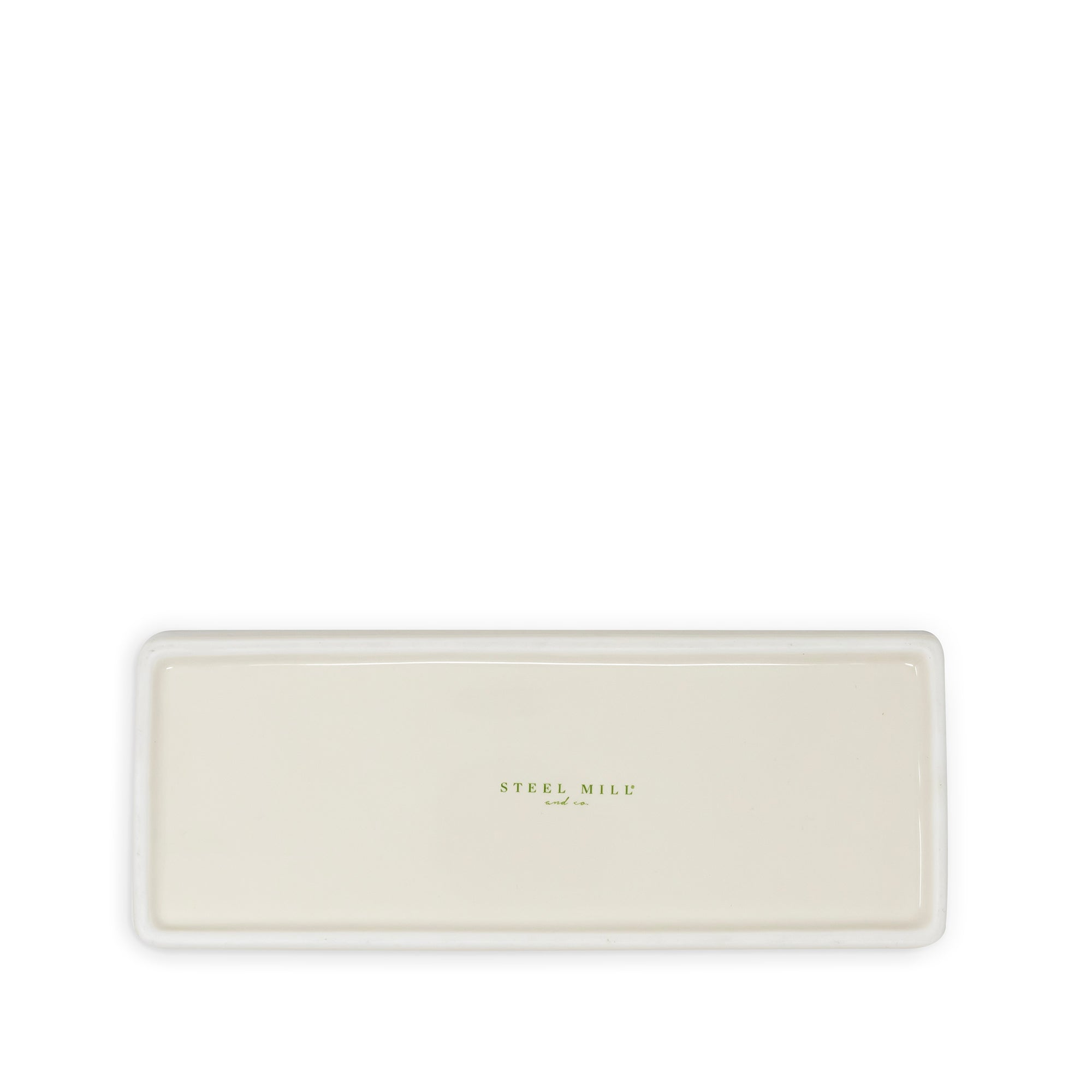 A rectangular ceramic serving platter in a warm cream color with a small gold foil logo reading 'STEEL MILL' in the center, shown on a solid white background.